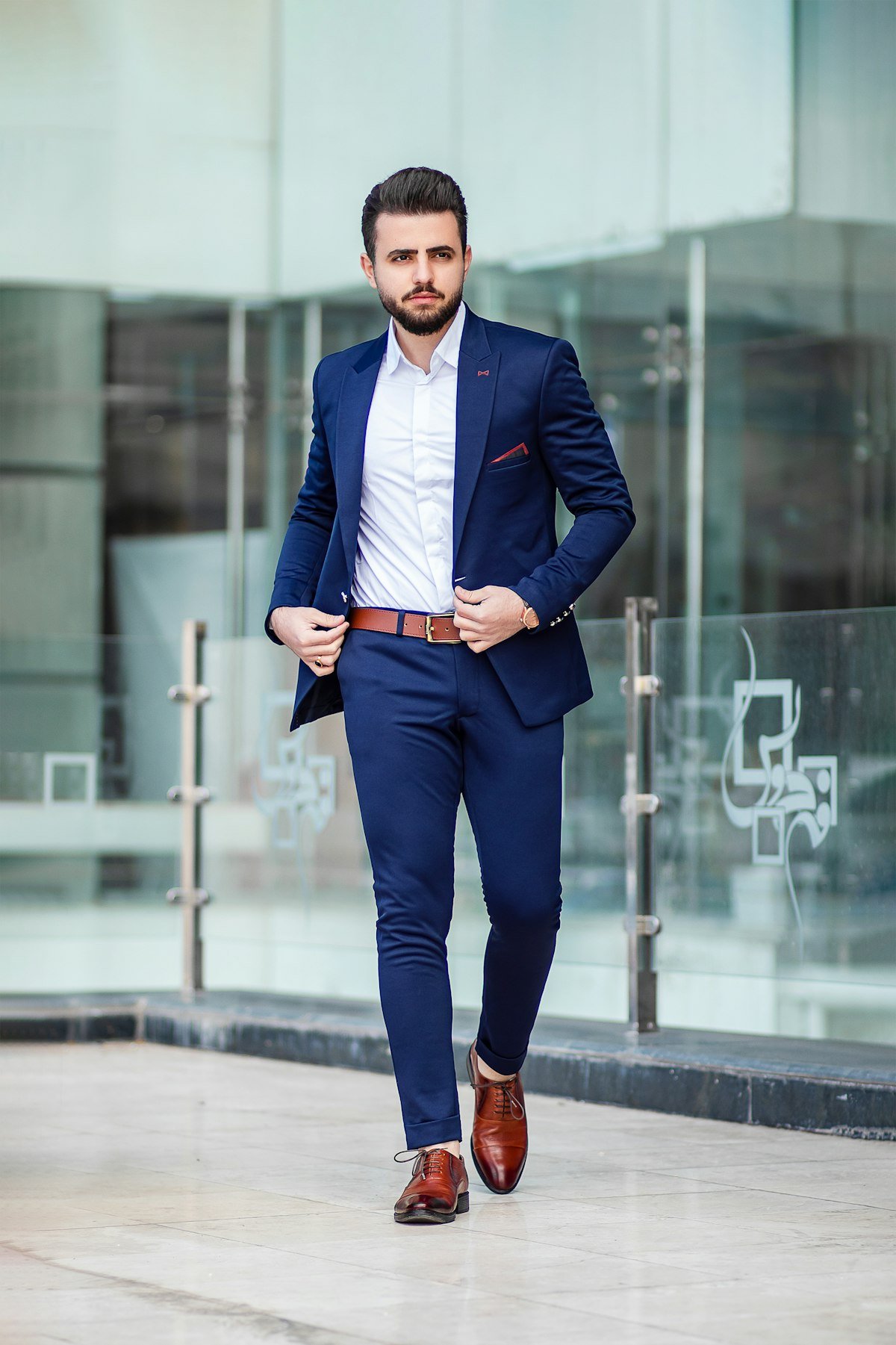 Stylish man in urban setting wearing modern fashion
